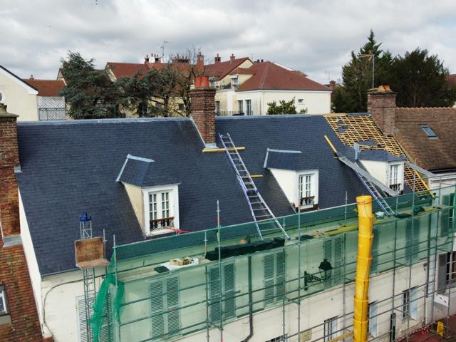 Rénovation complète d'une toiture de maison de ville